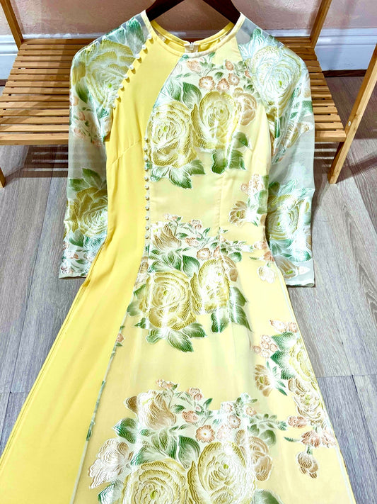 A24 - Áo Dài Đầm Tơ Hoa Vàng Tà Lệch